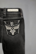 Eira Low-Rise Bootcut Jeans in Black