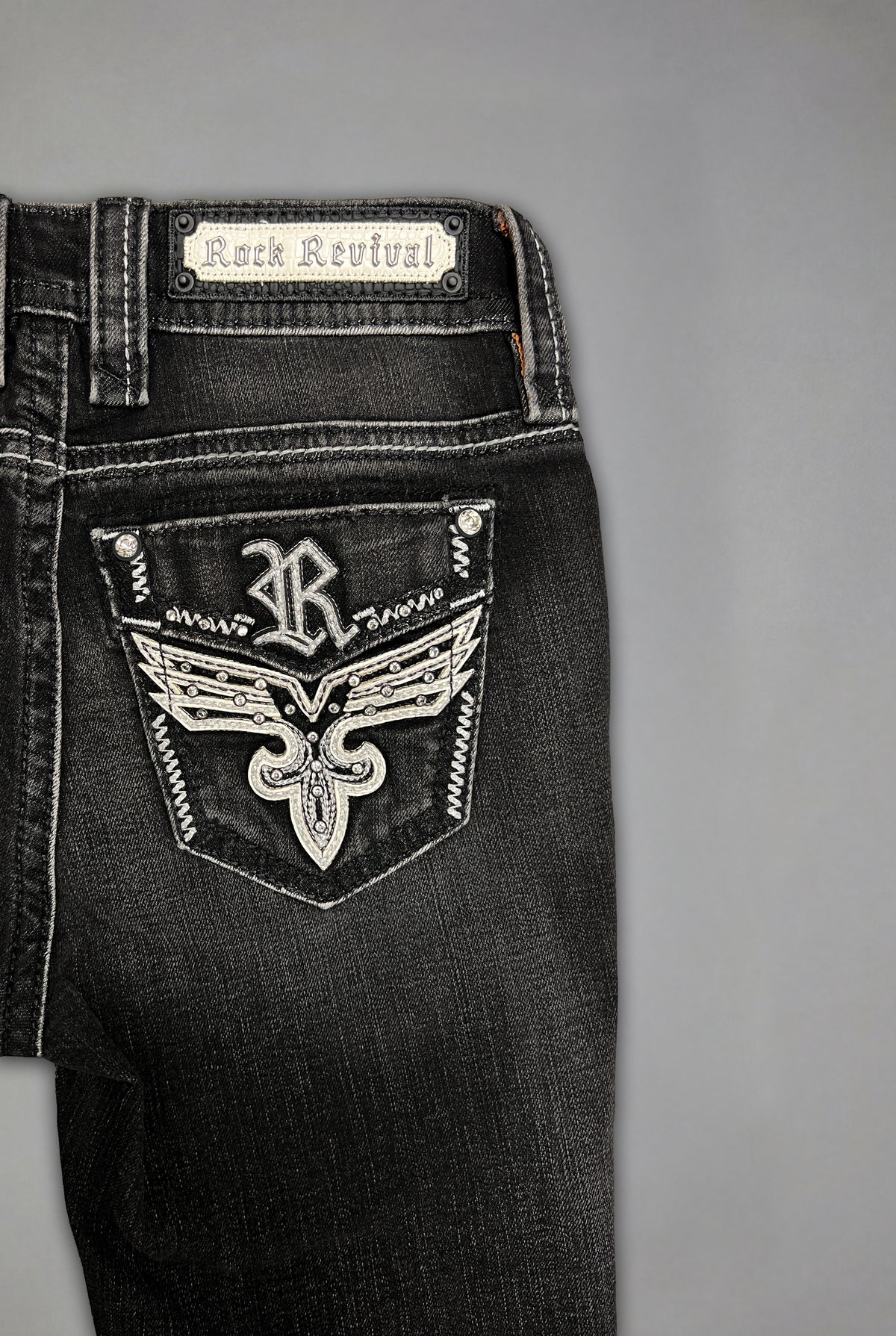Eira Low-Rise Bootcut Jeans in Black