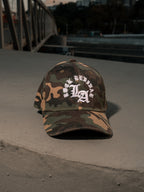 Rock Revival White Embroidery LA Logo Snapback Hat in Camo