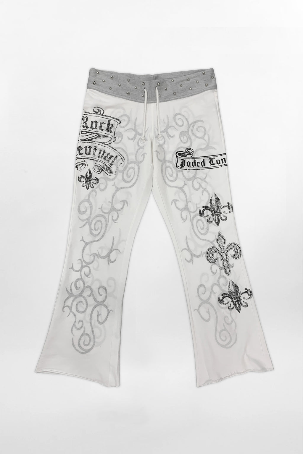 (JWL5808)Pantalones de chándal de tiro bajo Rock Revival by Jaded London con estampado gráfico en blanco